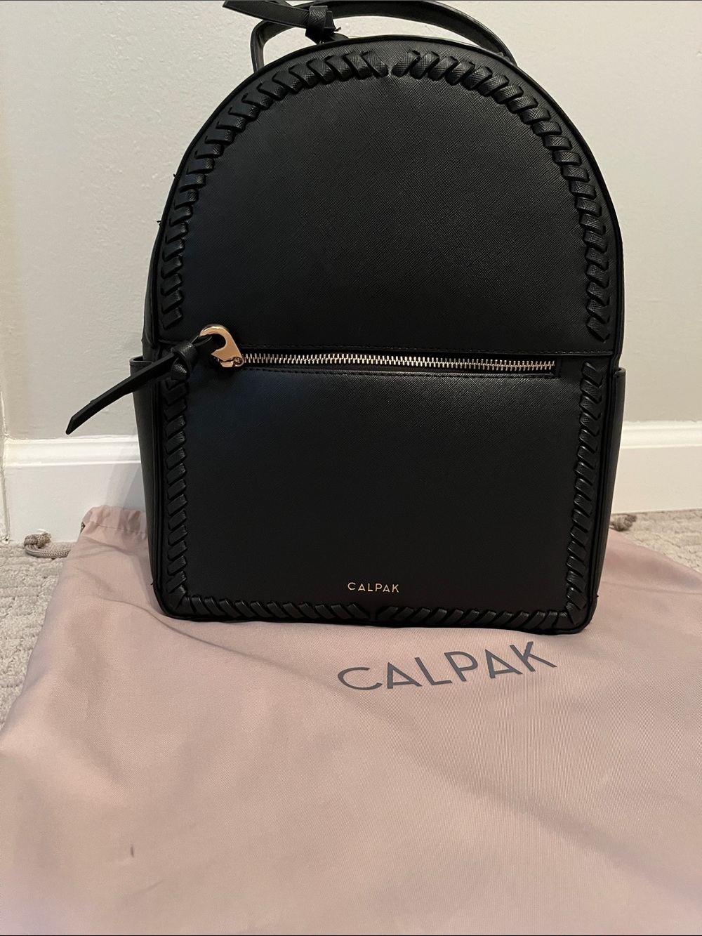 Calpak Black Mini Backpack with Whipstitch Detailing and Gold Hardware